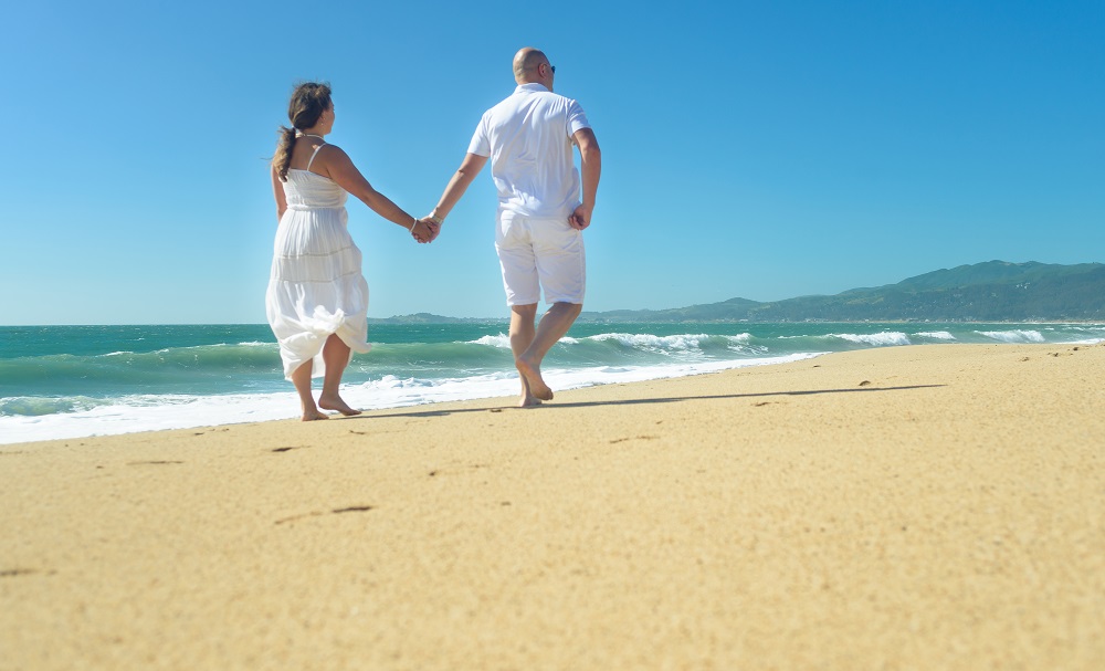 Couple-from-behind-beach-walking.jpg